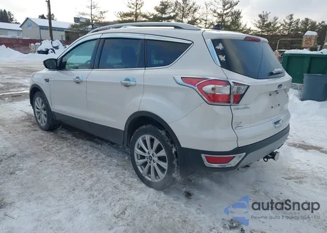 2018 Ford Escape Titanium z USA, uszkodzony, nr VIN 1FMCU9J97JUC21863